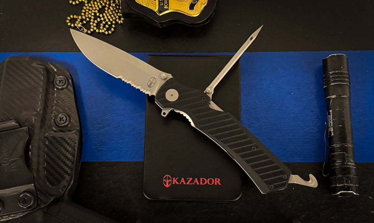 Huntsman border knife on top of a field interview notebook center by a gun holster on the left and a slim, small flashlight on the right